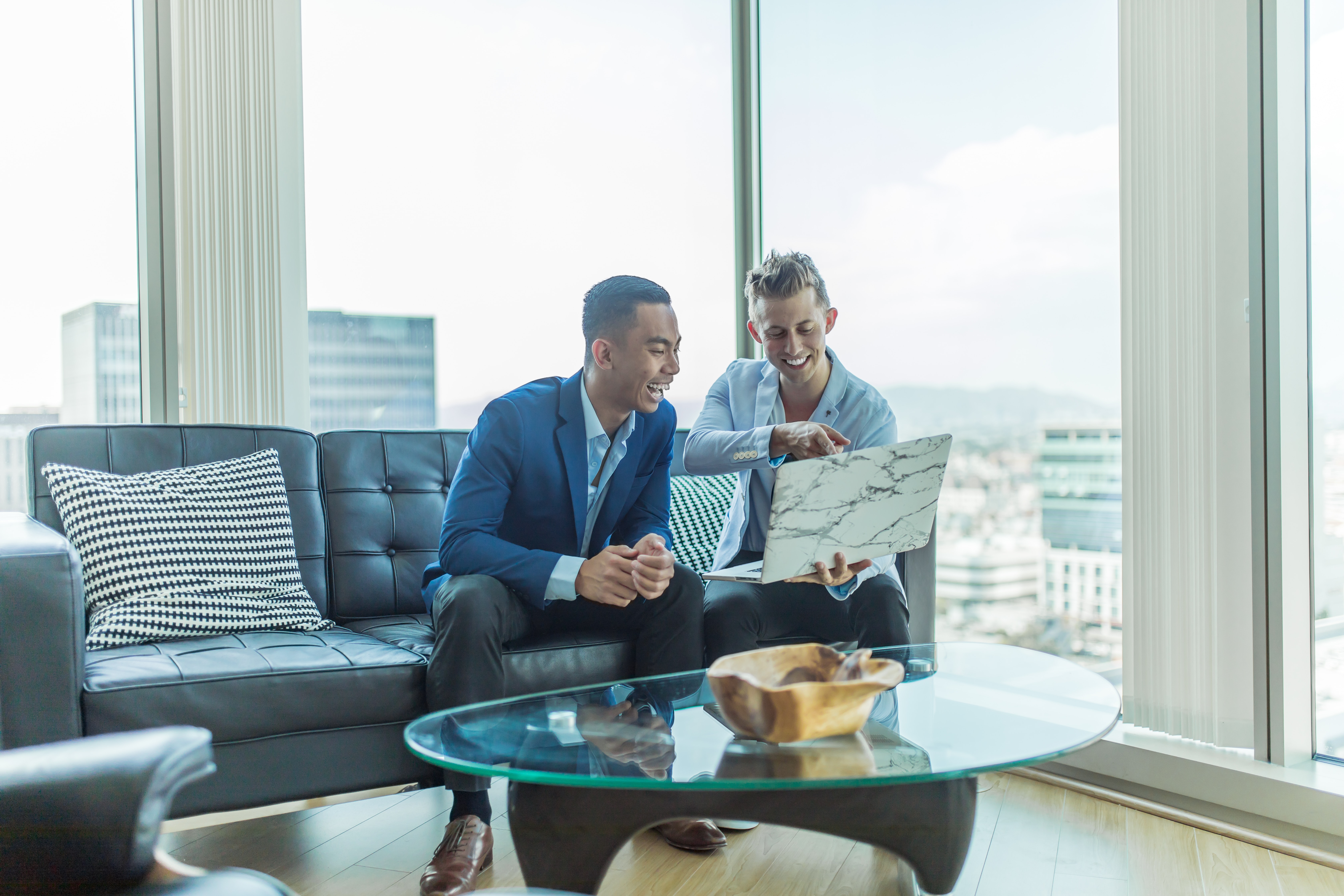 Agent and client reviewing listings together